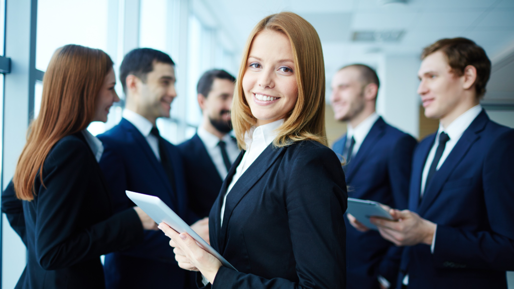 young entrepreneur with co workers background 1.webp